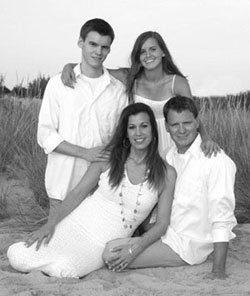 Jim with his wife Laura and two children